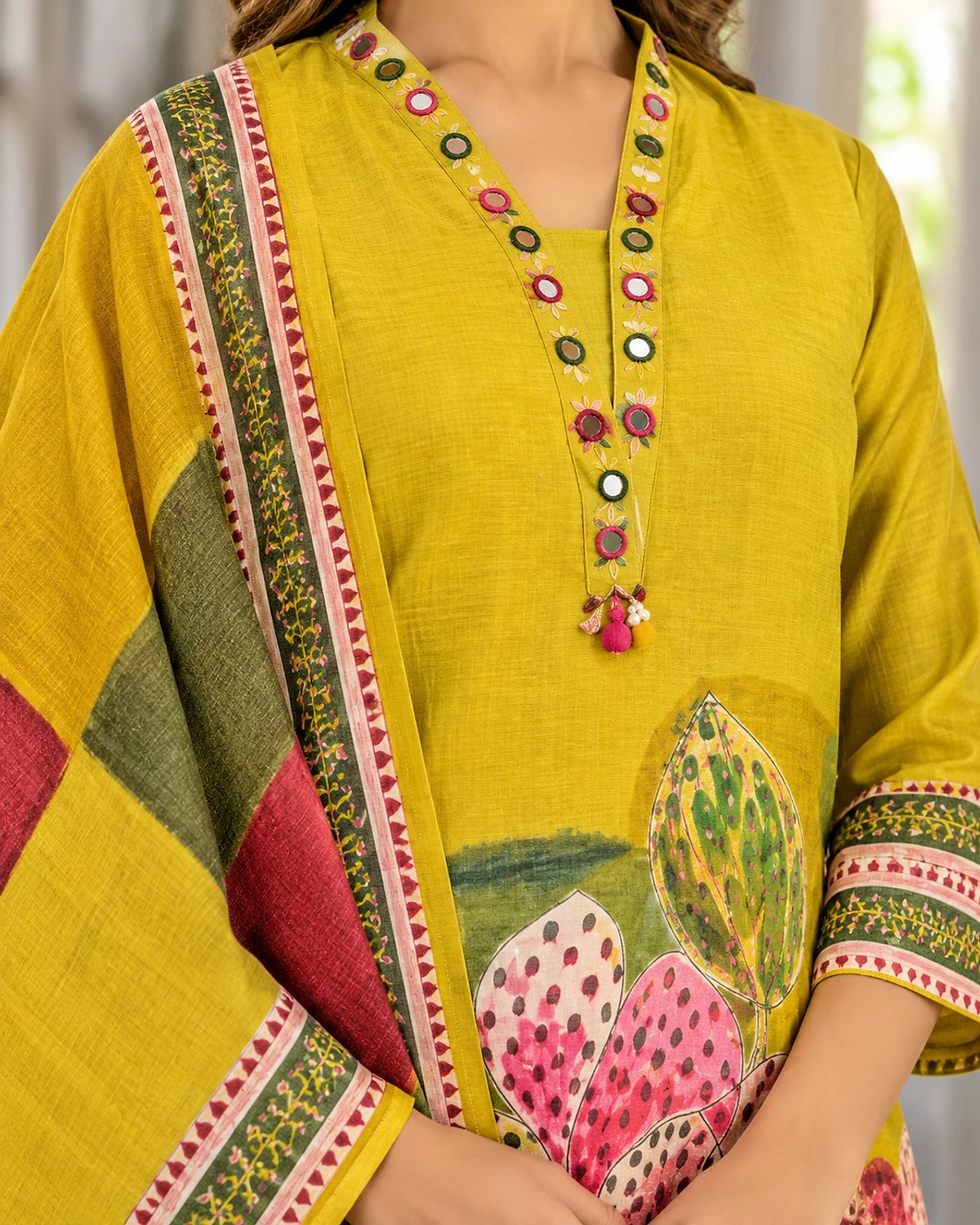 Close-up of the lime yellow kurta, showing a large lotus print