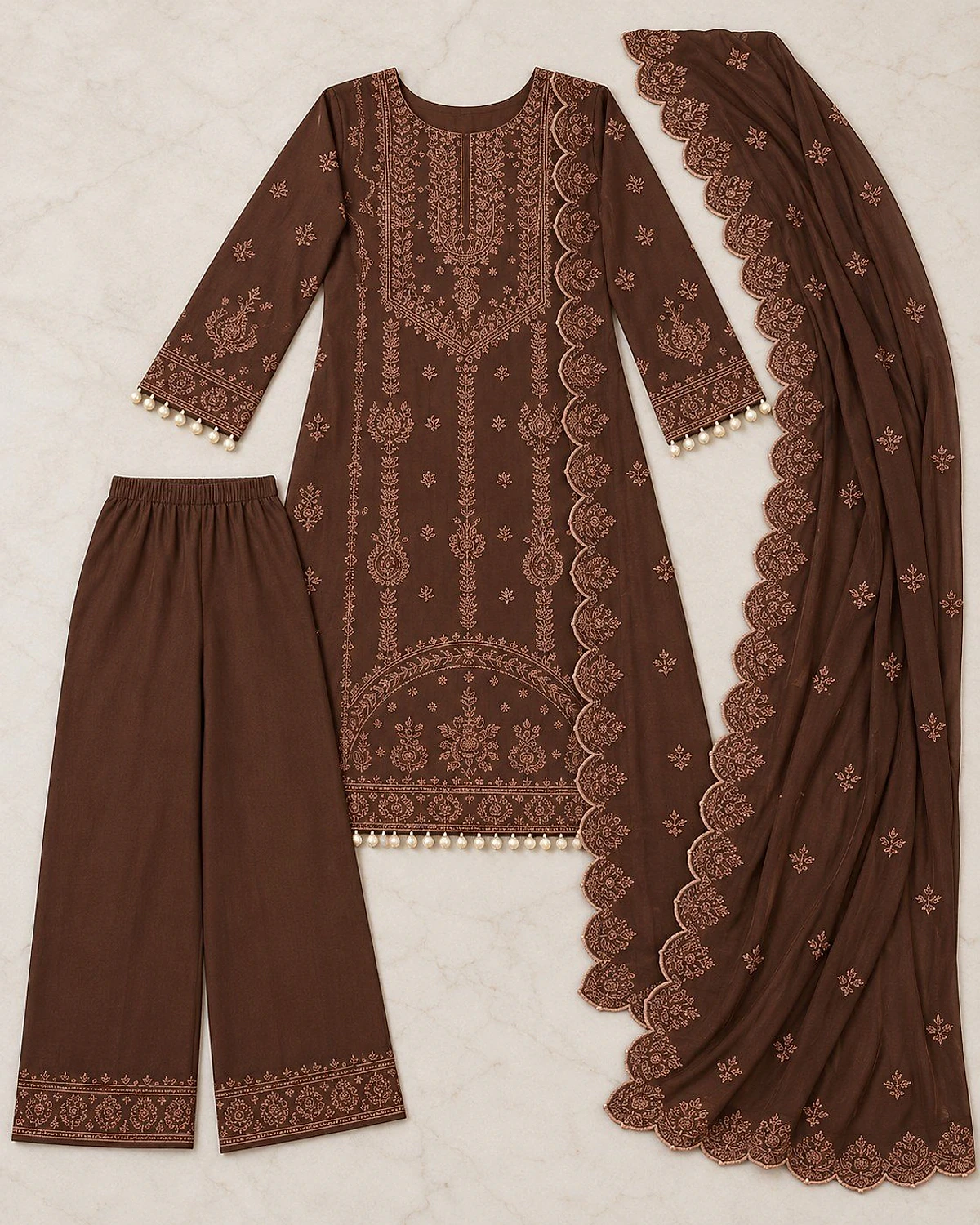 Coffee brown kurta, palazzo and dupatta laid out flat