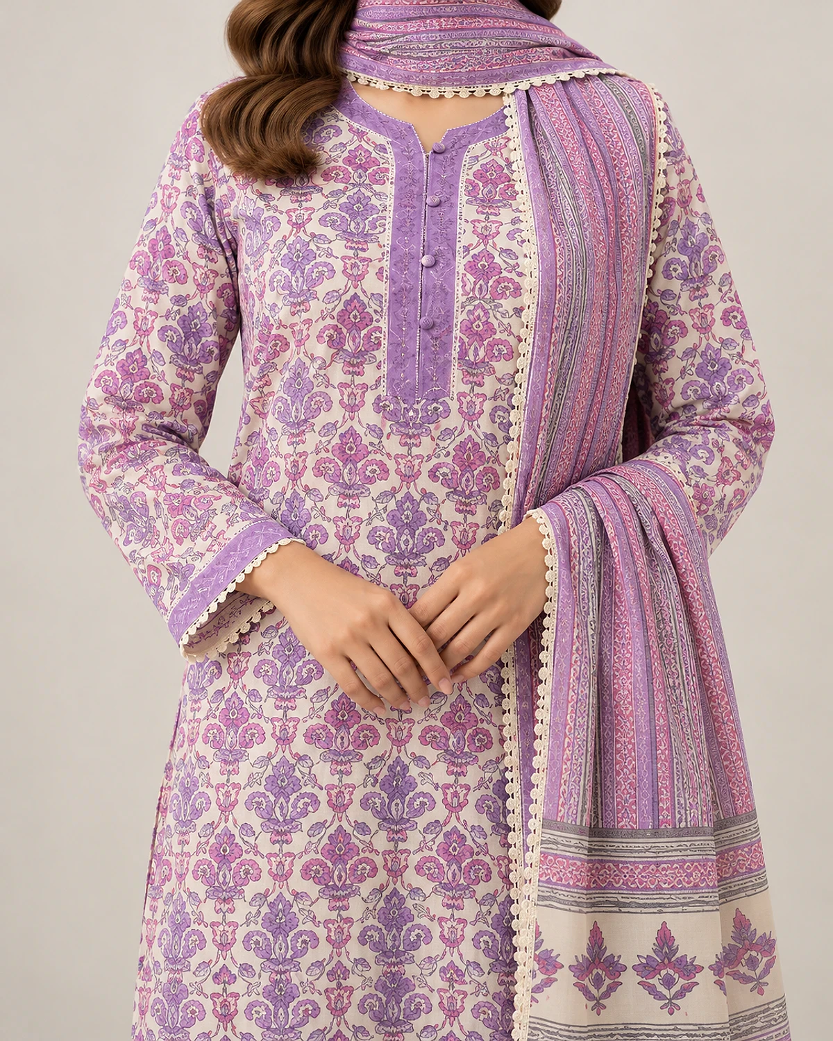 Close-up of the lavender kurta's print, placket and lace-edged dupatta