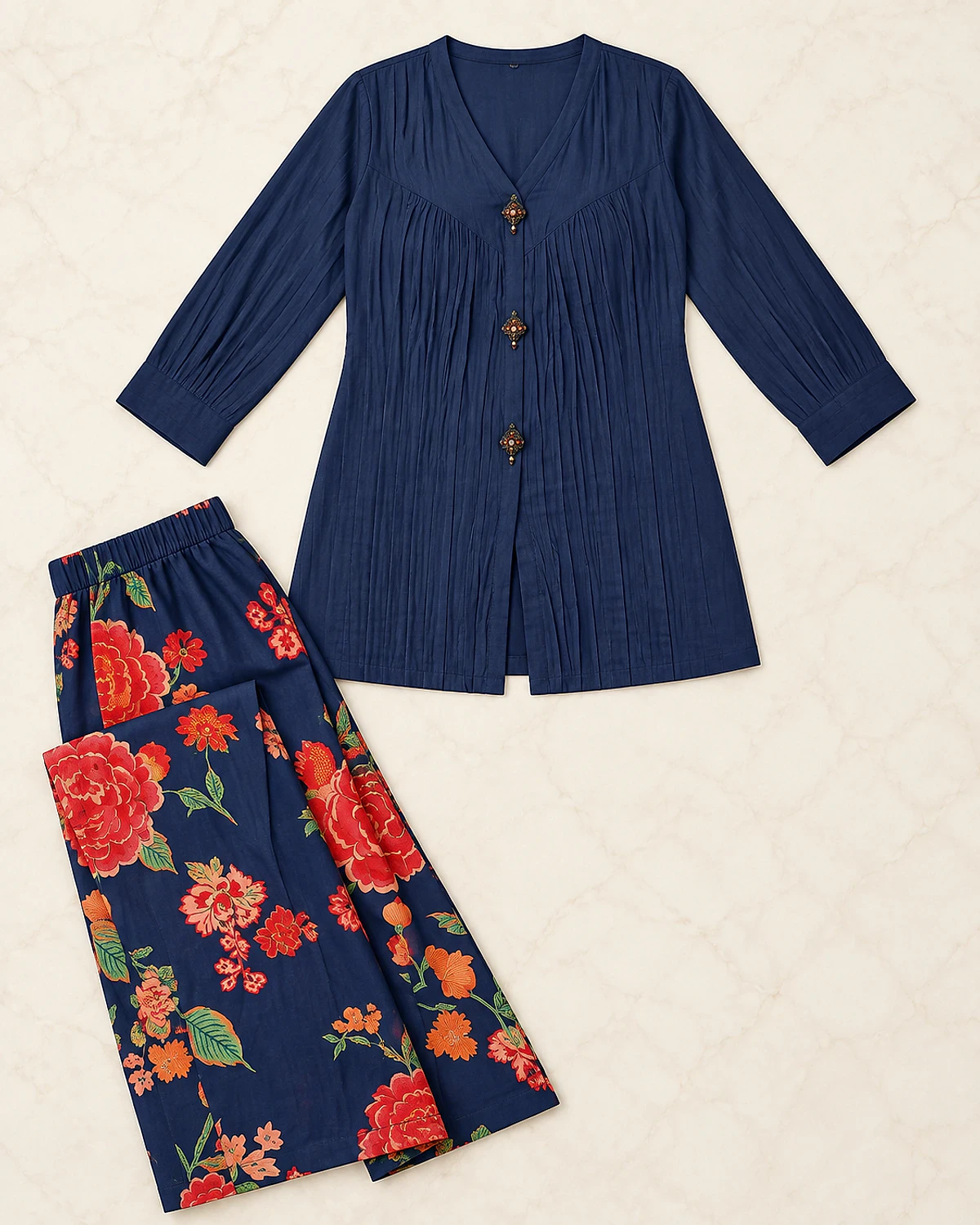 Navy crinkle top and floral palazzo laid out flat