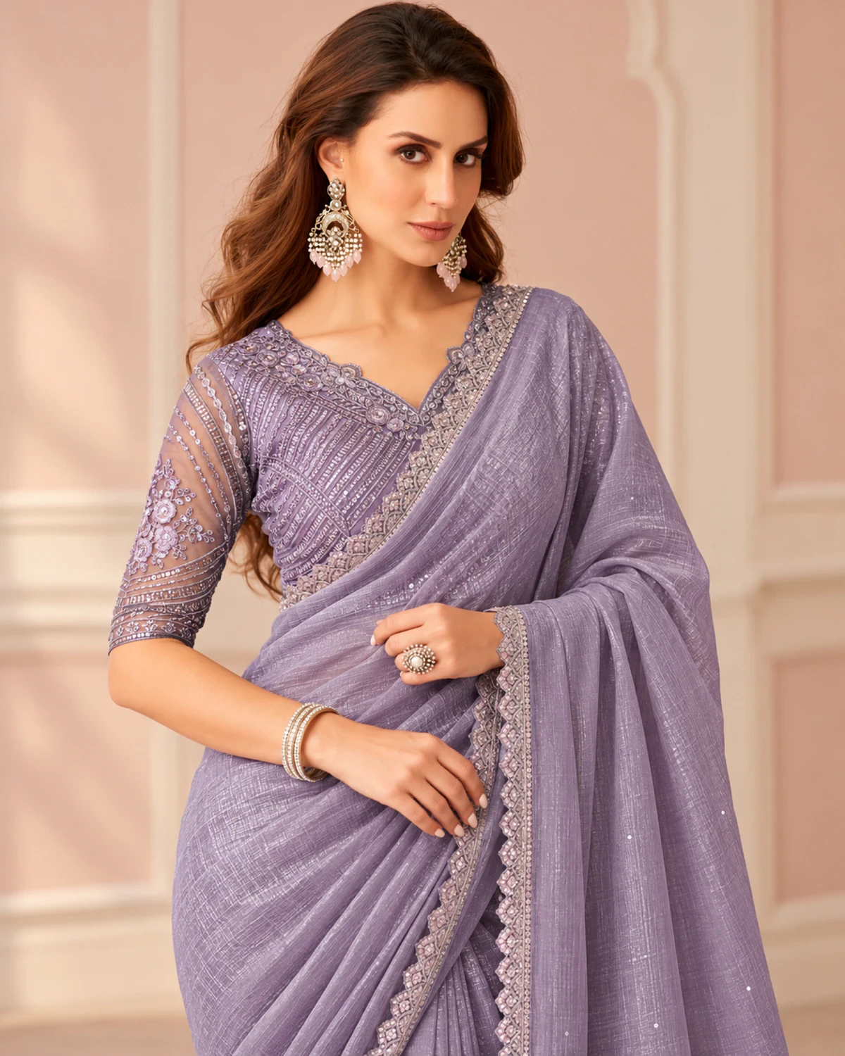 Close-up of the lavender georgette saree's border with a lavender embroidered blouse