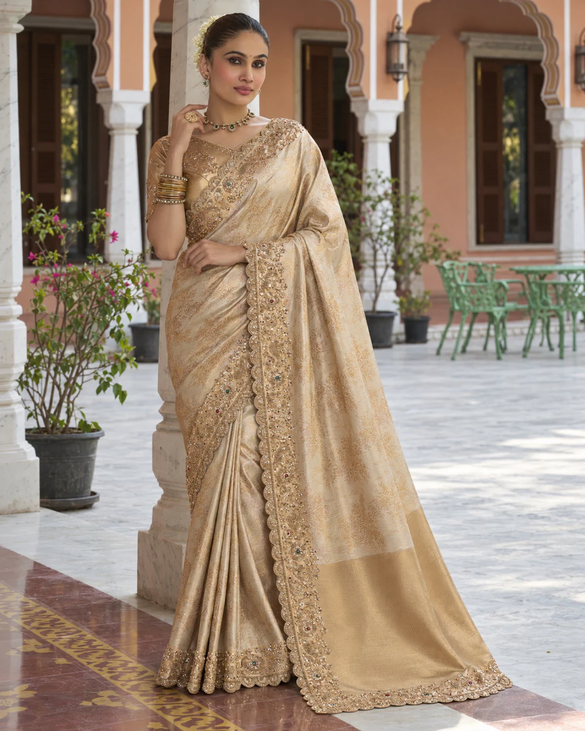 Full-length view of the ivory soft silk saree with its beaded border running down the front