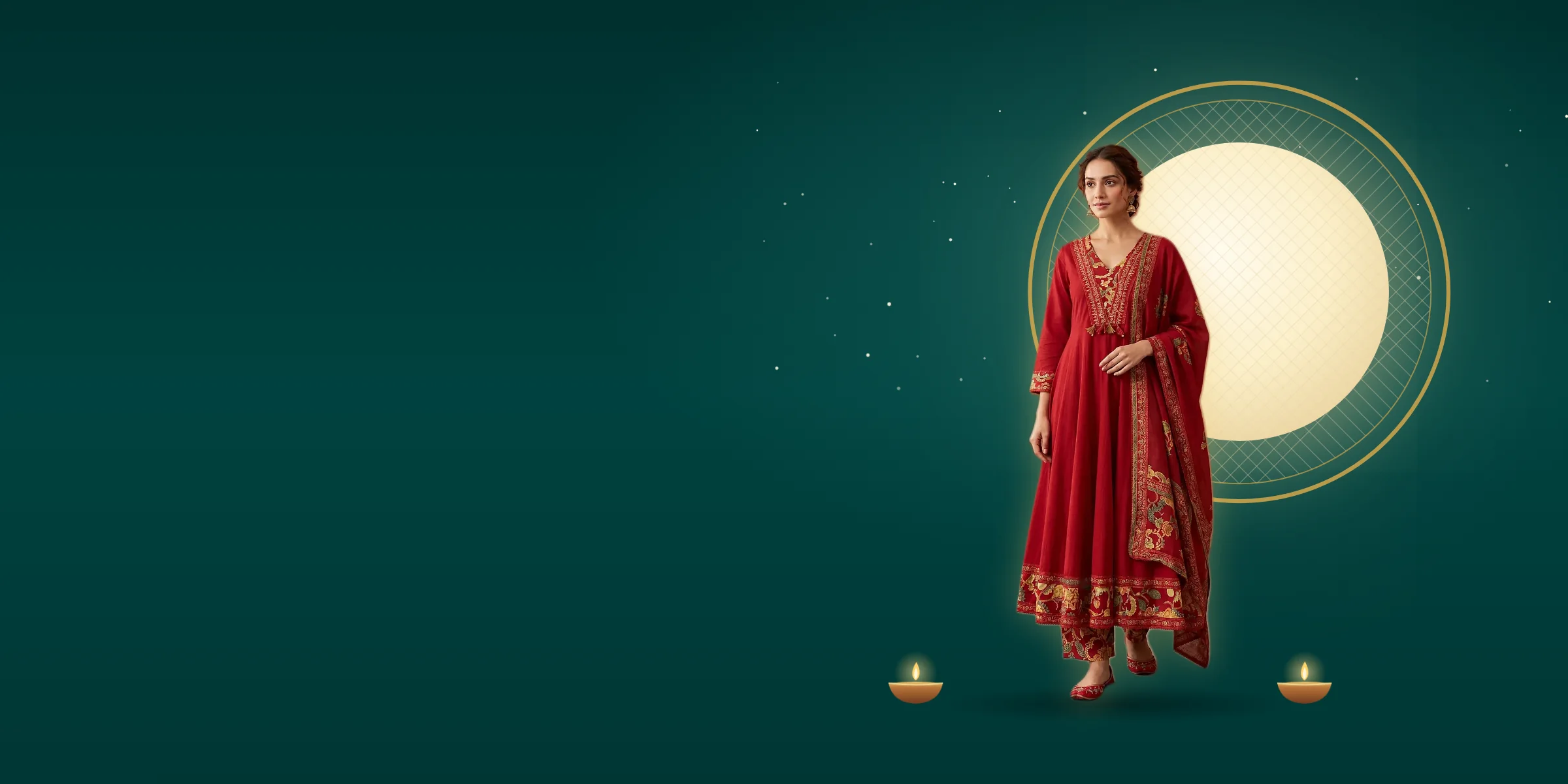 A woman in a red anarkali kurta set before the moon and a gold chhalni, with diyas